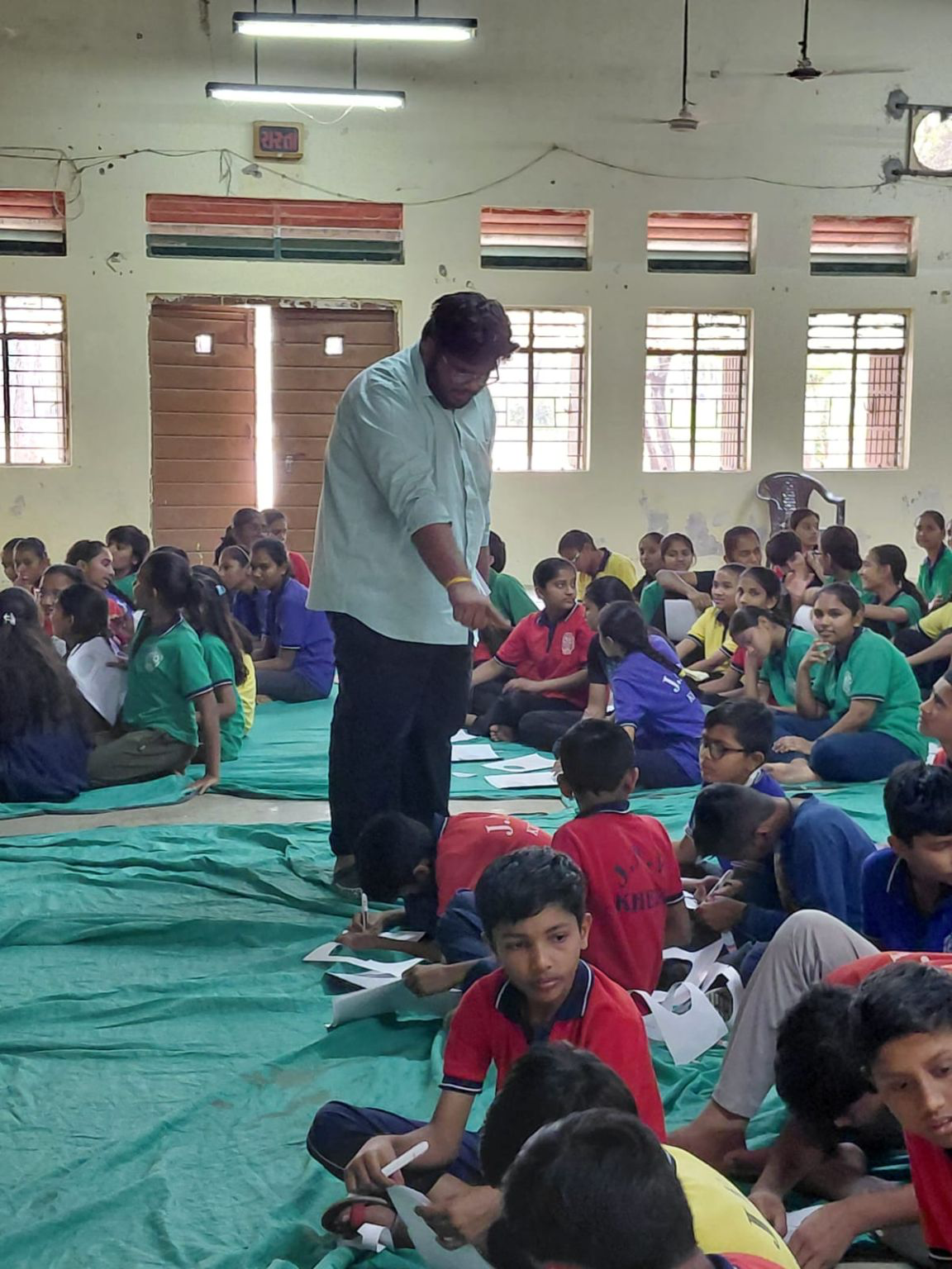 Students working on astronomy activities during the JNV Khatlal outreach program